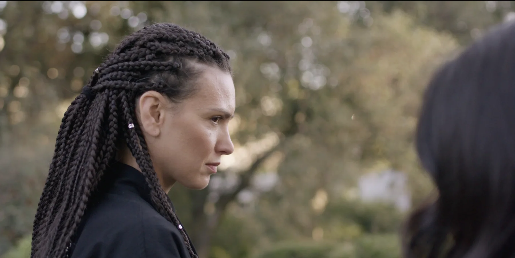 Albedo film still — the protector in profile