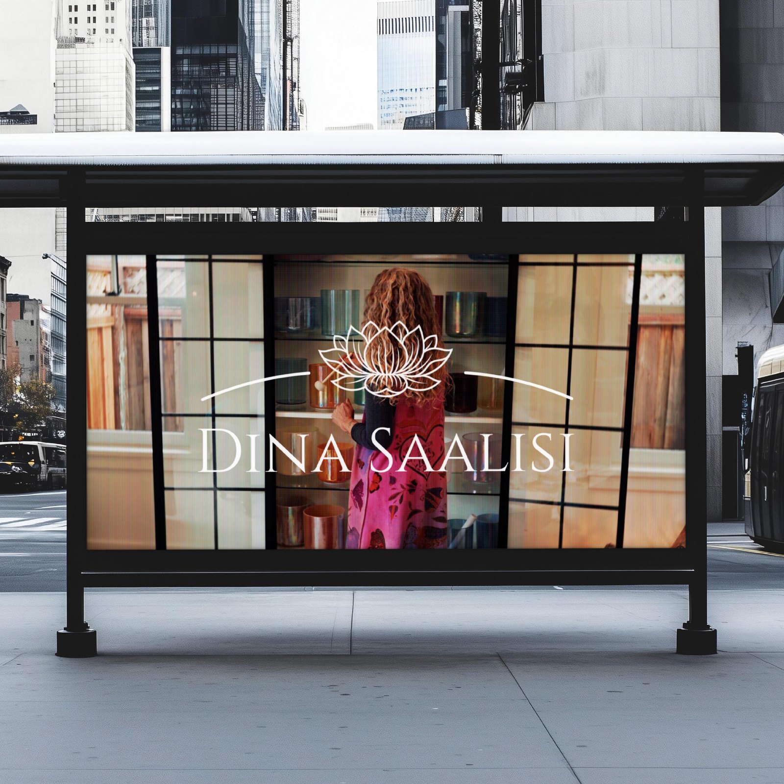 Dina Saalisi commercial — billboard at a city bus stop with lotus logo and brand still
